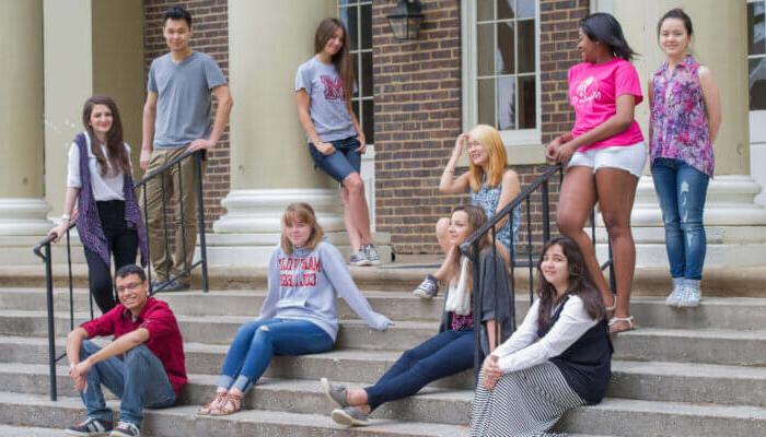 international students on the dinning hall steps